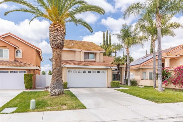 24701 New Haven Dr, Murrieta, CA 92562 - mediterranean / spanish-style house featuring a tile roof, stucco siding, driveway, and an attached garage