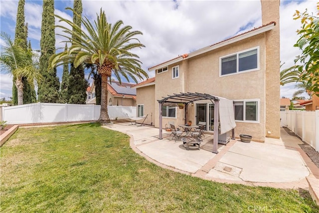 24701 New Haven Dr, Murrieta, CA 92562 - back of property with stucco siding, a pergola, and a patio area