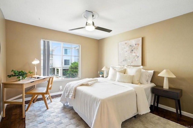 3078 Broadway Unit 210, San Diego, CA 92102 - bedroom with a desk, baseboards, wood finished floors, and a ceiling fan