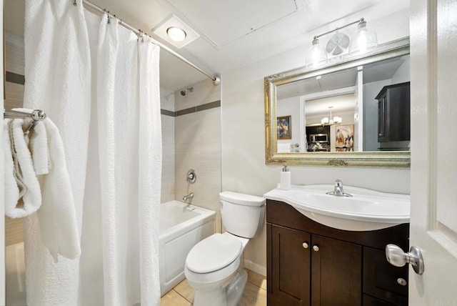 3078 Broadway Unit 210, San Diego, CA 92102 - full bathroom featuring shower / bath combination with curtain, toilet, vanity, tile patterned floors, and a chandelier