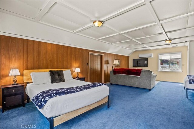 225 W 12th St, Chico, CA 95928 - carpeted bedroom featuring a wall mounted air conditioner, wood walls, and coffered ceiling