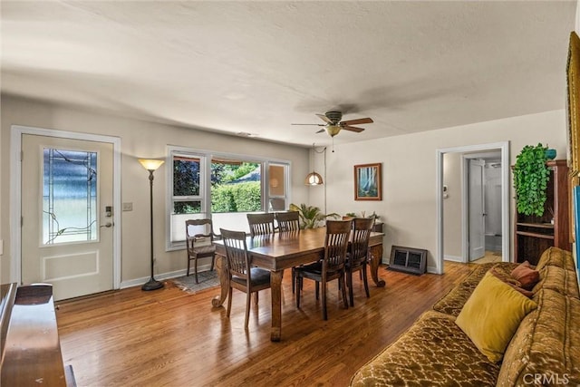 225 W 12th St, Chico, CA 95928 - dining space with ceiling fan, wood finished floors, and baseboards