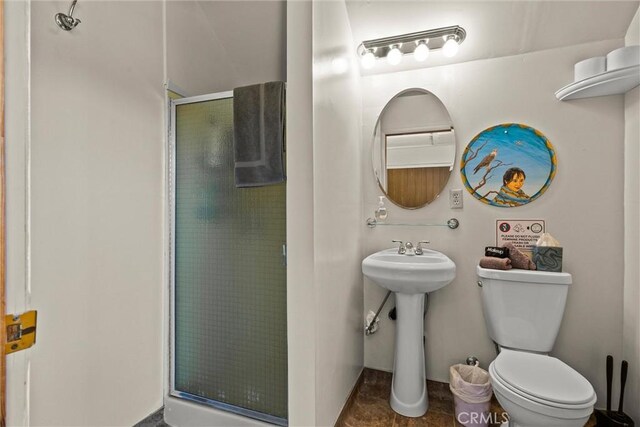 225 W 12th St, Chico, CA 95928 - full bath with a stall shower, toilet, and a sink