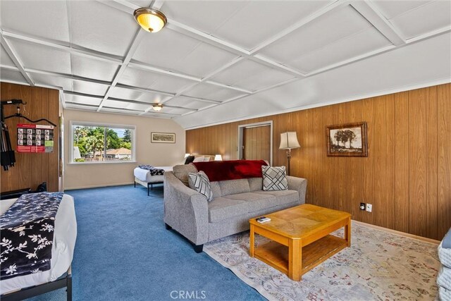 225 W 12th St, Chico, CA 95928 - living area featuring wooden walls, coffered ceiling, carpet floors, and baseboards