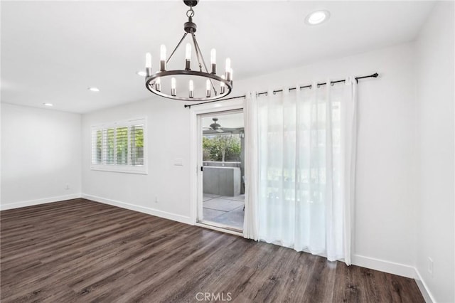 1762 Bern Dr, Corona, CA 92882 - unfurnished dining area featuring a chandelier, dark wood-style flooring, baseboards, and recessed lighting