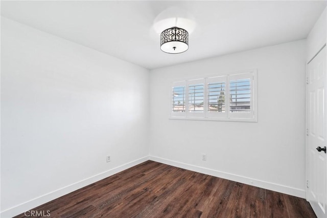 1762 Bern Dr, Corona, CA 92882 - empty room with baseboards and dark wood-type flooring