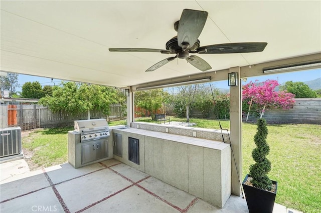 1762 Bern Dr, Corona, CA 92882 - view of patio with a ceiling fan and central AC