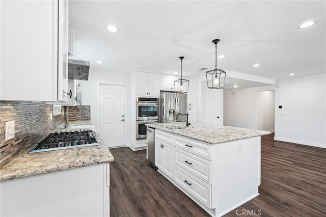 1762 Bern Dr, Corona, CA 92882 - kitchen with appliances with stainless steel finishes, backsplash, dark wood-style floors, a sink, and recessed lighting