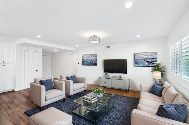 1762 Bern Dr, Corona, CA 92882 - living area with wood finished floors, recessed lighting, and baseboards