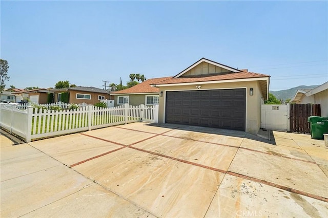 1762 Bern Dr, Corona, CA 92882 - ranch-style home featuring stucco siding, a fenced front yard, and concrete driveway