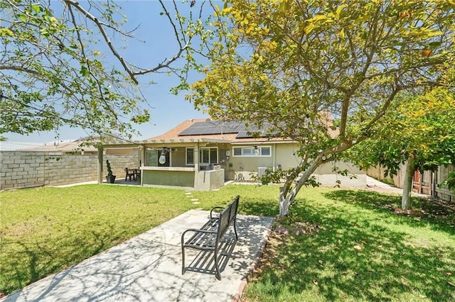 1762 Bern Dr, Corona, CA 92882 - rear view of property with solar panels, a patio, and stucco siding