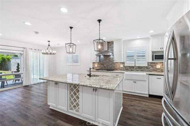 1762 Bern Dr, Corona, CA 92882 - kitchen with freestanding refrigerator, wall chimney exhaust hood, a sink, plenty of natural light, and recessed lighting