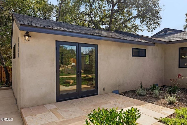 1068 Cuyama Rd, Ojai, CA 93023 - doorway to property with french doors, stucco siding, a patio, and a shingled roof