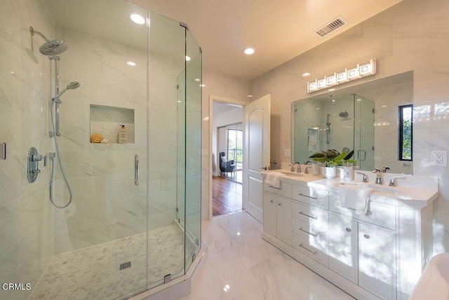 1068 Cuyama Rd, Ojai, CA 93023 - full bath featuring a shower stall, marble finish floors, double vanity, and recessed lighting