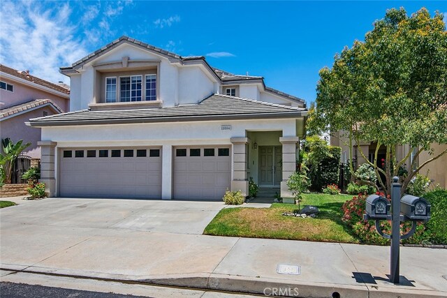11884 Mariposa Bay Ln, Porter Ranch, CA 91326 - view of front of home featuring a tiled roof, a garage, concrete driveway, and stucco siding