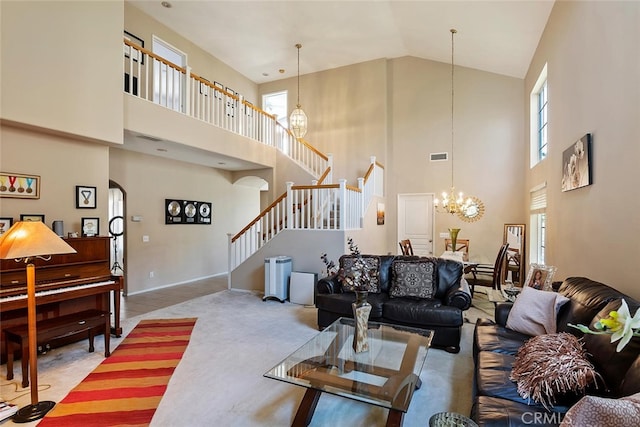 11884 Mariposa Bay Ln, Porter Ranch, CA 91326 - living room featuring stairs, high vaulted ceiling, arched walkways, a chandelier, and plenty of natural light