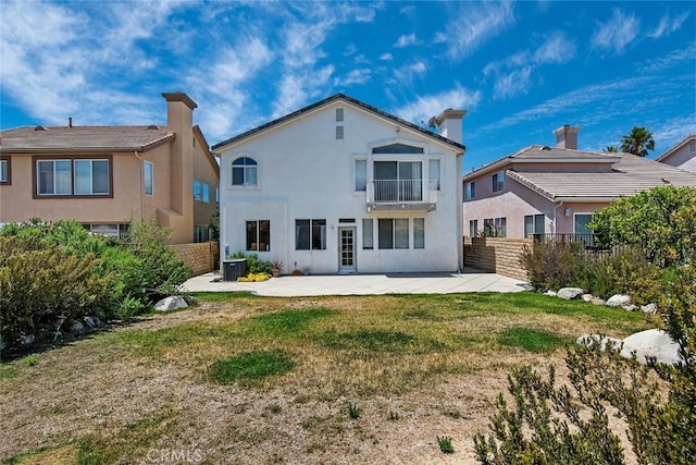 11884 Mariposa Bay Ln, Porter Ranch, CA 91326 - rear view of property featuring a balcony, a patio area, stucco siding, and central AC