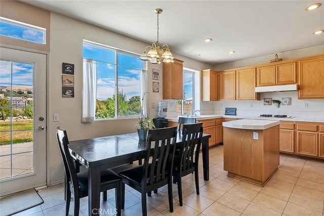 11884 Mariposa Bay Ln, Porter Ranch, CA 91326 - dining area featuring light tile patterned flooring, a chandelier, and recessed lighting