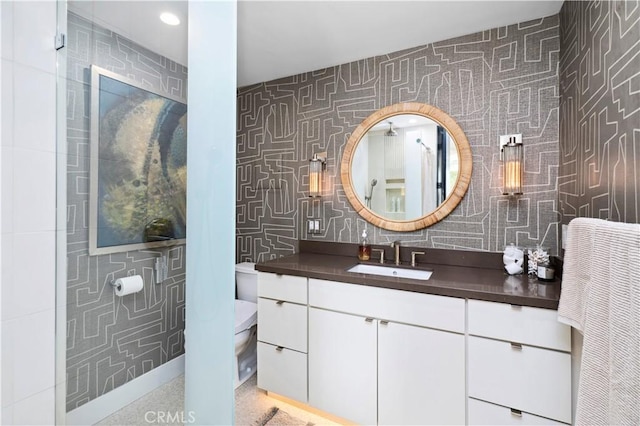741 Avocado Ave Unit 101, Corona Del Mar, CA 92625 - bathroom with toilet, vanity, tiled shower, and tile walls
