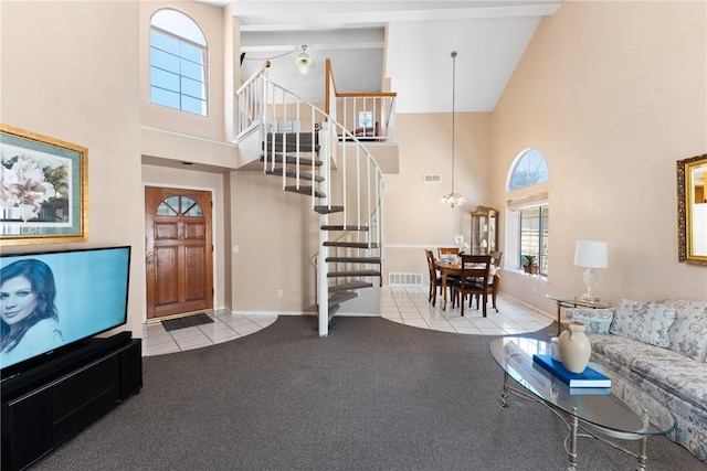 16051 Augusta Dr, Chino Hills, CA 91709 - carpeted living area with a high ceiling, tile patterned floors, stairs, and baseboards