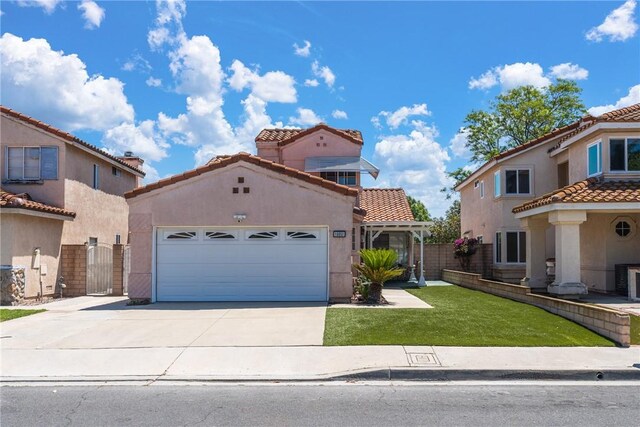 16051 Augusta Dr, Chino Hills, CA 91709 - mediterranean / spanish home featuring a tile roof, concrete driveway, a garage, and stucco siding