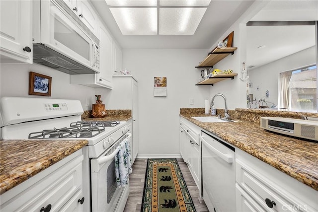 16404 Leffingwell Rd, Whittier, CA 90603 - kitchen featuring white appliances, a sink, dark wood-style floors, open shelves, and white cabinets