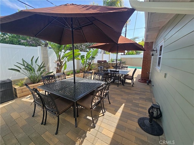 249 Loyola Rd, Costa Mesa, CA 92626 - fenced backyard featuring outdoor dining area and a patio area