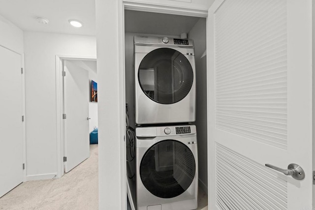 35180 Grove Trl, Fallbrook, CA 92028 - laundry area featuring stacked washing machine and dryer and carpet