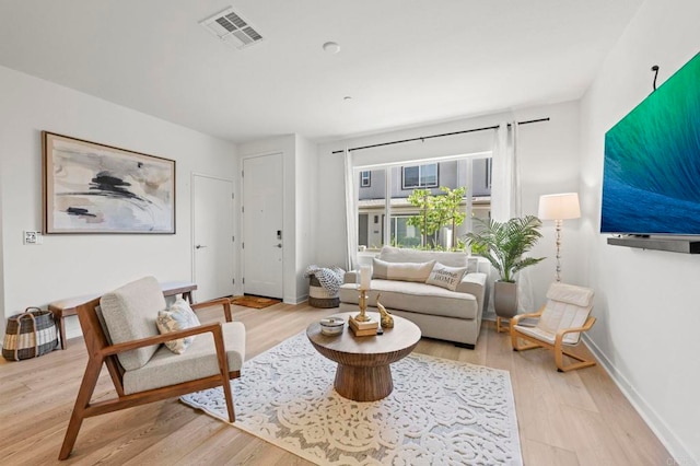 35180 Grove Trl, Fallbrook, CA 92028 - living room featuring light wood-style floors and baseboards
