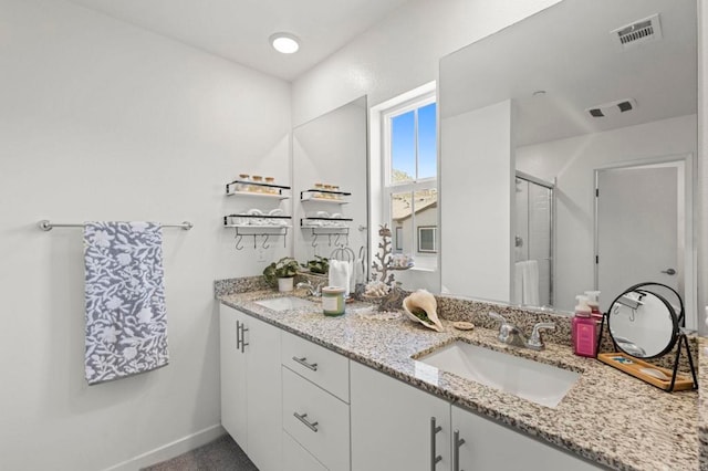 35180 Grove Trl, Fallbrook, CA 92028 - full bath with double vanity, a stall shower, and baseboards