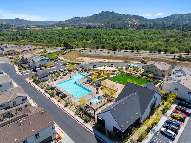 35180 Grove Trl, Fallbrook, CA 92028 - drone / aerial view of a mountain backdrop, a pool area, and a forest