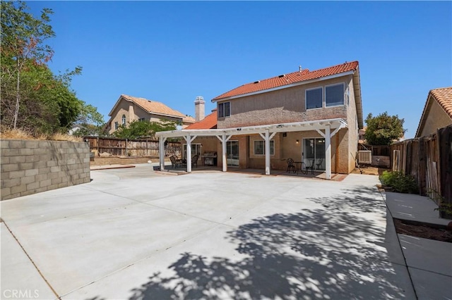 3314 Sandstone Ct, Palmdale, CA 93551 - rear view of property with a pergola, stucco siding, a patio, and a fenced backyard