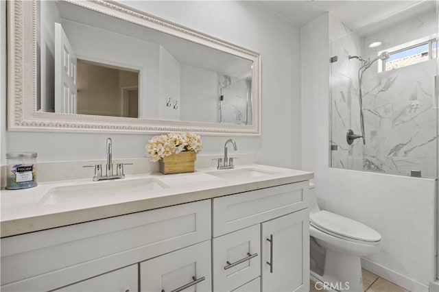 3314 Sandstone Ct, Palmdale, CA 93551 - full bath featuring double vanity, a marble finish shower, toilet, and tile patterned flooring