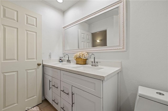 3314 Sandstone Ct, Palmdale, CA 93551 - bathroom with double vanity, toilet, and tile patterned flooring