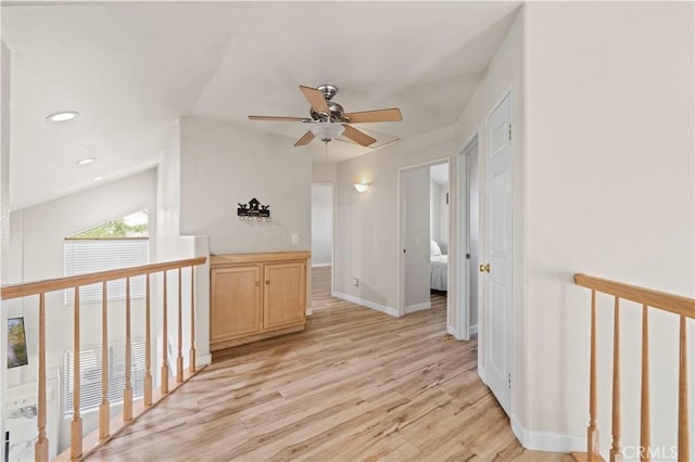 3314 Sandstone Ct, Palmdale, CA 93551 - hallway with light wood finished floors, baseboards, and recessed lighting