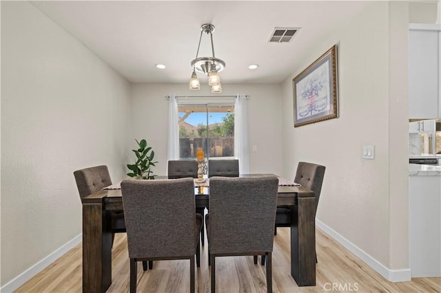 3314 Sandstone Ct, Palmdale, CA 93551 - dining area with light wood finished floors and baseboards
