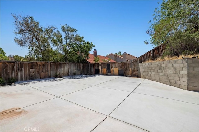 3314 Sandstone Ct, Palmdale, CA 93551 - fenced backyard with a patio area