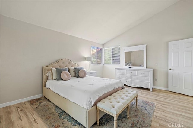 3314 Sandstone Ct, Palmdale, CA 93551 - bedroom with light wood-style floors, vaulted ceiling, and baseboards