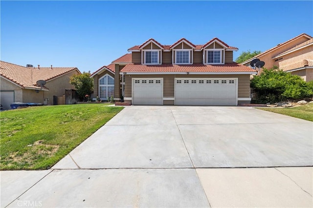 3314 Sandstone Ct, Palmdale, CA 93551 - view of front of home featuring a tile roof, driveway, a front yard, and an attached garage