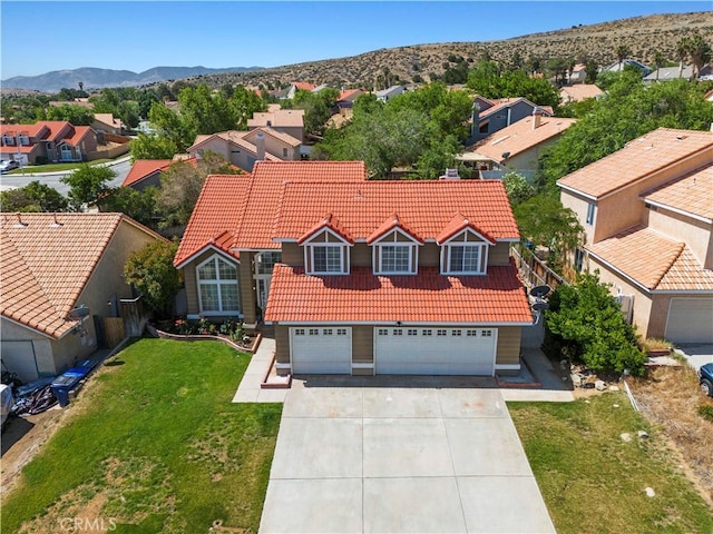 3314 Sandstone Ct, Palmdale, CA 93551 - aerial perspective of suburban area with a mountainous background
