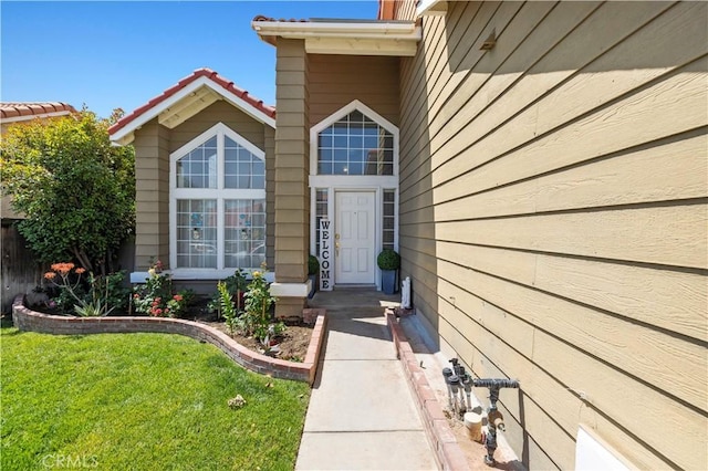 3314 Sandstone Ct, Palmdale, CA 93551 - doorway to property with a lawn
