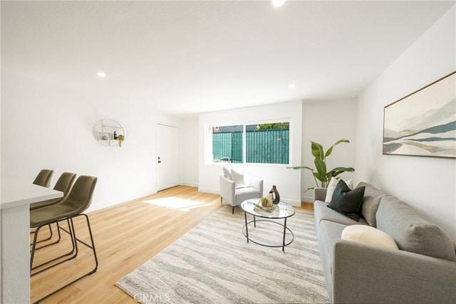 957 S Gramercy Dr Unit 105, Los Angeles, CA 90019 - living room featuring light wood-style floors and recessed lighting