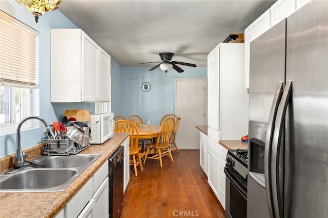 1524 Keko St, Oroville, CA 95965 - kitchen featuring stainless steel appliances, a sink, ceiling fan, and white cabinets