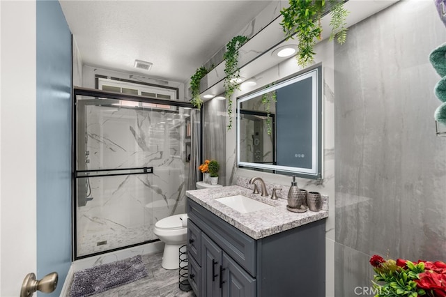 24457 Liolios Way, Moreno Valley, CA 92551 - full bath with a marble finish shower, vanity, and toilet
