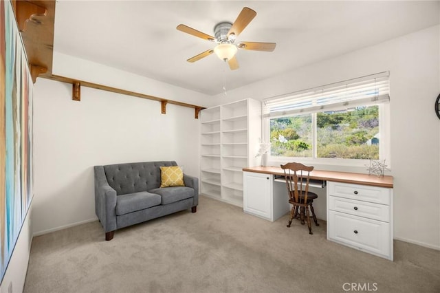 2365 Sommerset Dr, Brea, CA 92821 - home office with built in desk, light carpet, and a ceiling fan
