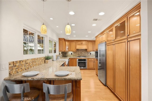 2365 Sommerset Dr, Brea, CA 92821 - kitchen featuring stainless steel appliances, a peninsula, crown molding, custom range hood, and backsplash