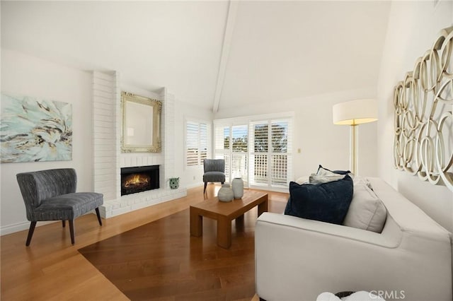 2365 Sommerset Dr, Brea, CA 92821 - living area featuring wood finished floors, a fireplace, and baseboards