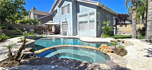 27324 Chesterfield Dr, Valencia, CA 91354 - view of swimming pool featuring a patio area, a pool with connected hot tub, and a fenced backyard