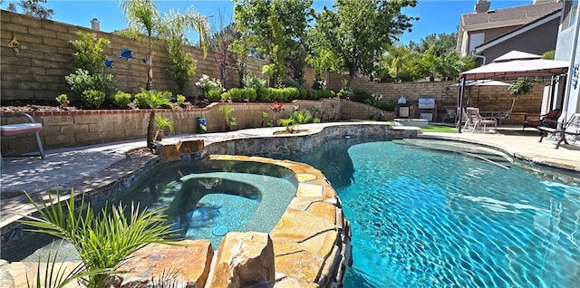 27324 Chesterfield Dr, Valencia, CA 91354 - view of pool with a gazebo, a fenced backyard, a pool with connected hot tub, and a patio