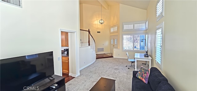 27324 Chesterfield Dr, Valencia, CA 91354 - home office with high vaulted ceiling, baseboards, and dark carpet